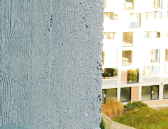Image showing the pattern of the wood shuttering used to build Park Hill preserved in the surface of the concrete